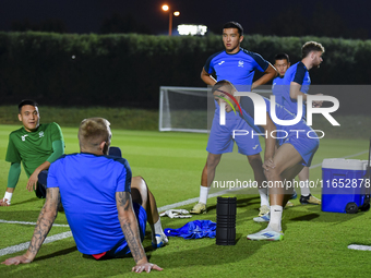 Players of the Kyrgyzstan National team train at Qatar University training pitch in Doha, Qatar, on October 9, 2024, ahead of the FIFA World...