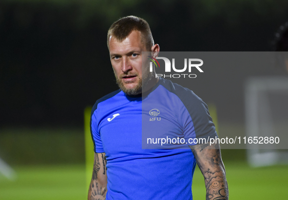 Kyrgyzstan team player Kichin Valerii participates in the training session at Qatar University training pitch in Doha, Qatar, on October 9,...