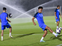 Players of the Kyrgyzstan National team train at Qatar University training pitch in Doha, Qatar, on October 9, 2024, ahead of the FIFA World...