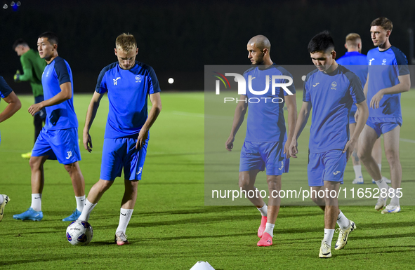 Players of the Kyrgyzstan National team train at Qatar University training pitch in Doha, Qatar, on October 9, 2024, ahead of the FIFA World...