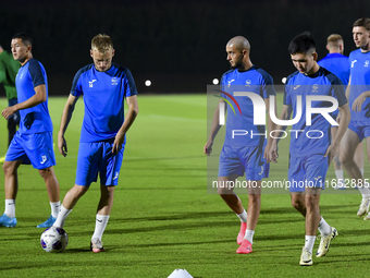 Players of the Kyrgyzstan National team train at Qatar University training pitch in Doha, Qatar, on October 9, 2024, ahead of the FIFA World...