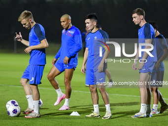 Players of the Kyrgyzstan National team train at Qatar University training pitch in Doha, Qatar, on October 9, 2024, ahead of the FIFA World...