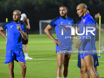 Players of the Kyrgyzstan National team train at Qatar University training pitch in Doha, Qatar, on October 9, 2024, ahead of the FIFA World...