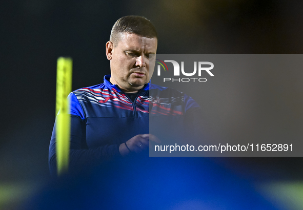 Head coach Maksim Lisitsyn (R) of the Kyrgyzstan National Team attends a training session at Qatar University training pitch in Doha, Qatar,...