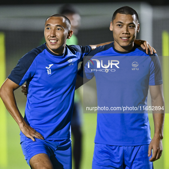 Players of the Kyrgyzstan National team train at Qatar University training pitch in Doha, Qatar, on October 9, 2024, ahead of the FIFA World...