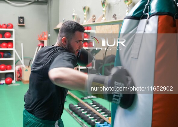 An athlete of Panathinaikos Boxing Club exercises in Athens, Greece, on October 9, 2024. 