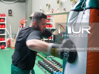 An athlete of Panathinaikos Boxing Club exercises in Athens, Greece, on October 9, 2024. (