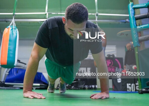 An athlete of Panathinaikos Boxing Club exercises in Athens, Greece, on October 9, 2024. 