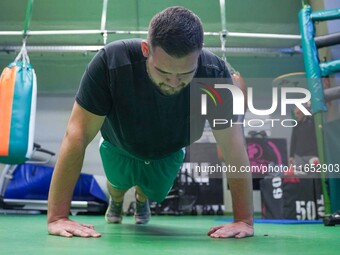 An athlete of Panathinaikos Boxing Club exercises in Athens, Greece, on October 9, 2024. (