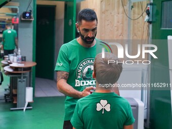 Second coach Giannis Manolis of Panathinaikos Boxing Club teaches youngsters in Athens, Greece, on October 9, 2024. (