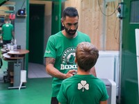 Second coach Giannis Manolis of Panathinaikos Boxing Club teaches youngsters in Athens, Greece, on October 9, 2024. (