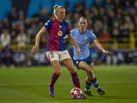 Fridolina Rolfo #16 of FC Barcelona is in possession of the ball during the UEFA Women's Champions League Group D match between Manchester C...