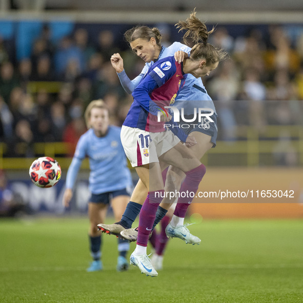 Kerstin Casparij #18 of Manchester City W.F.C. is challenged by Graham #10 of FC Barcelona during the UEFA Women's Champions League Group D...