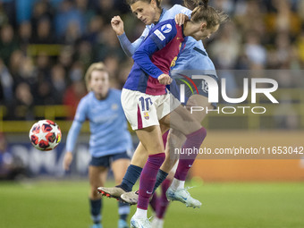 Kerstin Casparij #18 of Manchester City W.F.C. is challenged by Graham #10 of FC Barcelona during the UEFA Women's Champions League Group D...