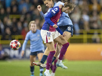 Kerstin Casparij #18 of Manchester City W.F.C. is challenged by Graham #10 of FC Barcelona during the UEFA Women's Champions League Group D...