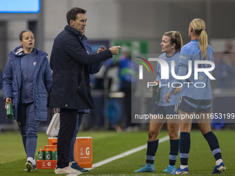 Manchester City W.F.C. manager Gareth Taylor gives instructions to Jill Roord #10 of Manchester City W.F.C. during the UEFA Women's Champion...