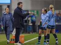 Manchester City W.F.C. manager Gareth Taylor gives instructions to Jill Roord #10 of Manchester City W.F.C. during the UEFA Women's Champion...