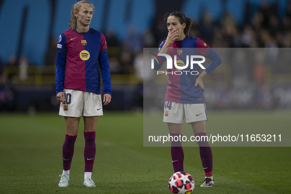 Aitana Bonmati #14 of FC Barcelona and Graham #10 of FC Barcelona participate in the UEFA Women's Champions League Group D match between Man...