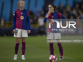 Aitana Bonmati #14 of FC Barcelona and Graham #10 of FC Barcelona participate in the UEFA Women's Champions League Group D match between Man...