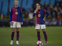 Aitana Bonmati #14 of FC Barcelona and Graham #10 of FC Barcelona participate in the UEFA Women's Champions League Group D match between Man...