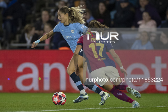 Ewa Pajor #17 of FC Barcelona tackles the opponent during the UEFA Women's Champions League Group D match between Manchester City and FC Bar...