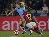 Ewa Pajor #17 of FC Barcelona tackles the opponent during the UEFA Women's Champions League Group D match between Manchester City and FC Bar...