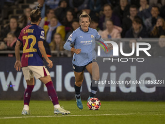 Lauren Hemp #11 of Manchester City W.F.C. is tackled by Ona Batlle #22 of FC Barcelona during the UEFA Women's Champions League Group D matc...