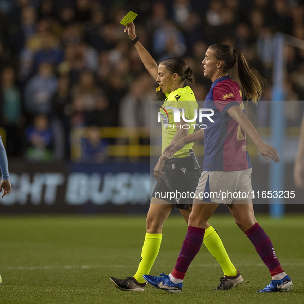 Referee Stephanie Frappart shows a yellow card to Laia Aleixandri #4 of Manchester City W.F.C. during the UEFA Women's Champions League Grou...