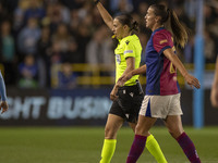 Referee Stephanie Frappart shows a yellow card to Laia Aleixandri #4 of Manchester City W.F.C. during the UEFA Women's Champions League Grou...