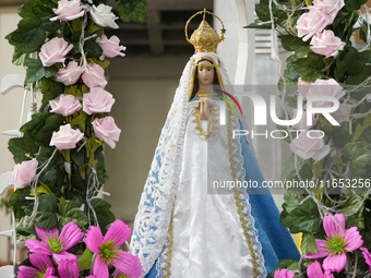 The Virgin of the Rosary of San Nicolas is one of the many titles under which the figure of the Virgin Mary is venerated in Catholicism. Eve...