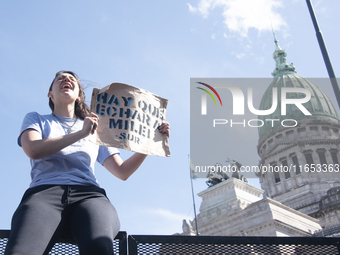 Students demonstrate in the Argentine national congress against the university financing law in Buenos Aires, Argentina, on October 9, 2024....