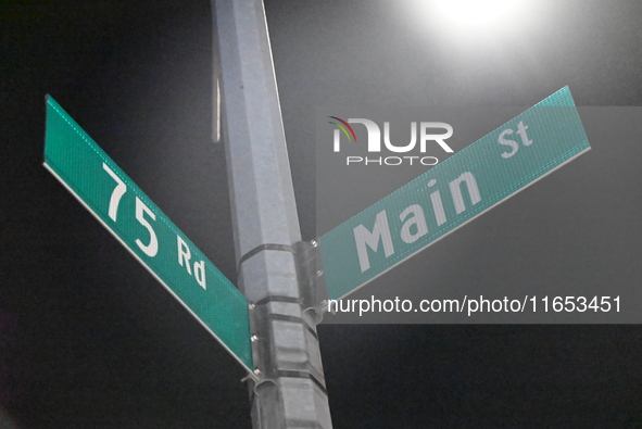 Street signage marks the location of the assault. Detectives investigate the scene and search the area in the evening hours following a hate...