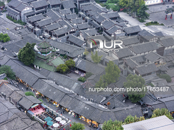 An aerial photo taken in Dujiangyan, China, on October 9, 2024, shows the ancient city complex of Guxian County in Dujiangyan City, Sichuan...