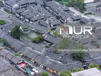 An aerial photo taken in Dujiangyan, China, on October 9, 2024, shows the ancient city complex of Guxian County in Dujiangyan City, Sichuan...