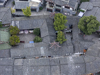 An aerial photo taken in Dujiangyan, China, on October 9, 2024, shows the ancient city complex of Guxian County in Dujiangyan City, Sichuan...