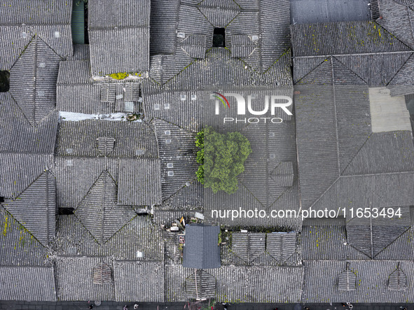 An aerial photo taken in Dujiangyan, China, on October 9, 2024, shows the ancient city complex of Guxian County in Dujiangyan City, Sichuan...