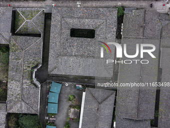 An aerial photo taken in Dujiangyan, China, on October 9, 2024, shows the ancient city complex of Guxian County in Dujiangyan City, Sichuan...