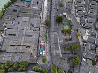 An aerial photo taken in Dujiangyan, China, on October 9, 2024, shows the ancient city complex of Guxian County in Dujiangyan City, Sichuan...