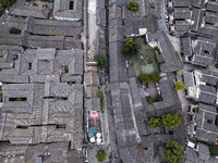 An aerial photo taken in Dujiangyan, China, on October 9, 2024, shows the ancient city complex of Guxian County in Dujiangyan City, Sichuan...