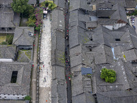 An aerial photo taken in Dujiangyan, China, on October 9, 2024, shows the ancient city complex of Guxian County in Dujiangyan City, Sichuan...