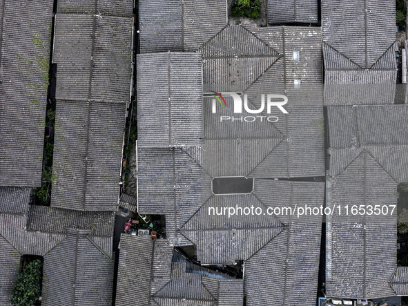 An aerial photo taken in Dujiangyan, China, on October 9, 2024, shows the ancient city complex of Guxian County in Dujiangyan City, Sichuan...