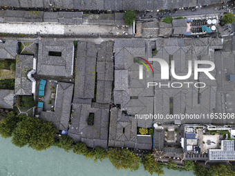 An aerial photo taken in Dujiangyan, China, on October 9, 2024, shows the ancient city complex of Guxian County in Dujiangyan City, Sichuan...