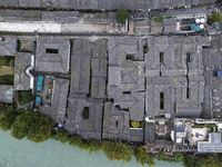 An aerial photo taken in Dujiangyan, China, on October 9, 2024, shows the ancient city complex of Guxian County in Dujiangyan City, Sichuan...