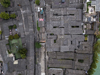 An aerial photo taken in Dujiangyan, China, on October 9, 2024, shows the ancient city complex of Guxian County in Dujiangyan City, Sichuan...