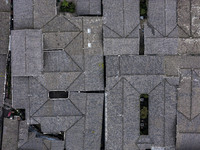 An aerial photo taken in Dujiangyan, China, on October 9, 2024, shows the ancient city complex of Guxian County in Dujiangyan City, Sichuan...