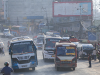 Vehicles depart from Kathmandu, Nepal, on October 10, 2024, as they ferry passengers out of the valley with the arrival of the fortnightly f...