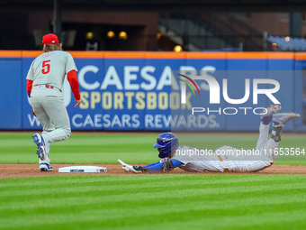 Mark Vientos #27 of the New York Mets doubles during the second inning in Game 4 of a baseball NL Division Series against the Philadelphia P...