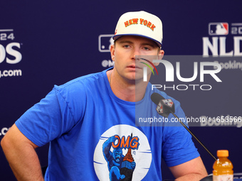 New York Mets' Pete Alonso #20 speaks to the media during a press conference before Game 4 of a baseball NL Division Series against the Phil...