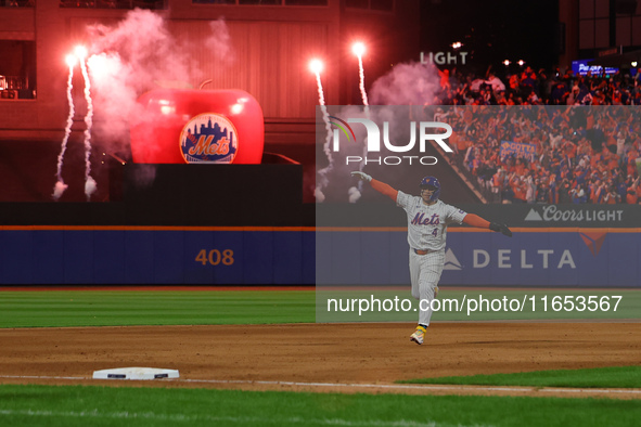 Francisco Alvarez of the New York Mets rounds the bases on Francisco Lindor's grand slam home run during the sixth inning in Game 4 of the N...