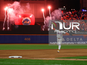 Francisco Alvarez of the New York Mets rounds the bases on Francisco Lindor's grand slam home run during the sixth inning in Game 4 of the N...